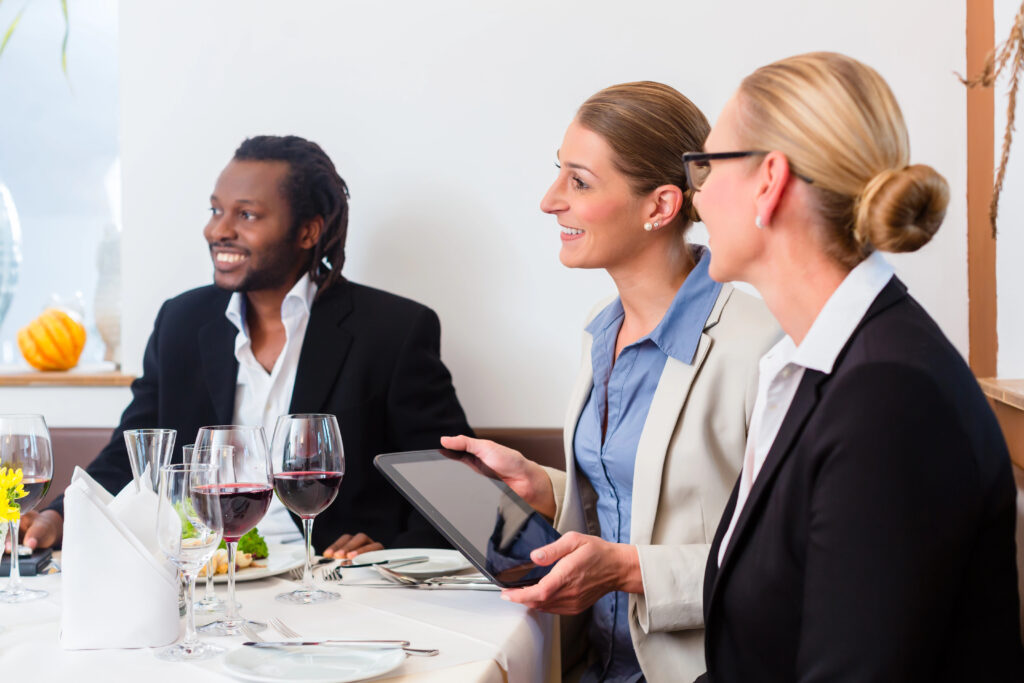 Professional coworkers enjoying a lunch together prepared by a Palm Springs private chef